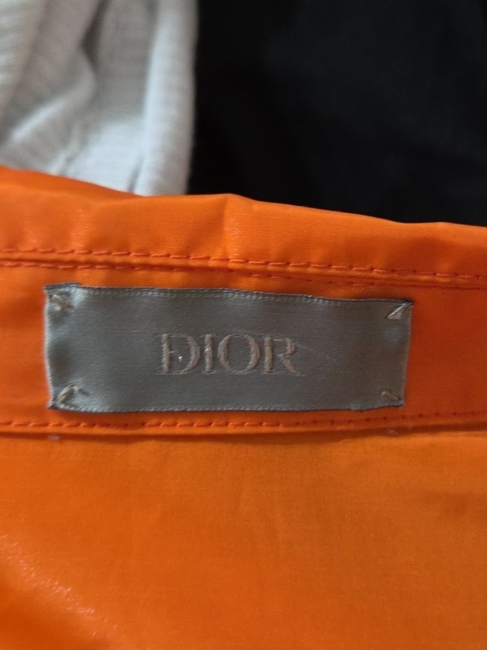 Dior Orange Jacket with Silver Label